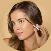 Girl filling in her brows