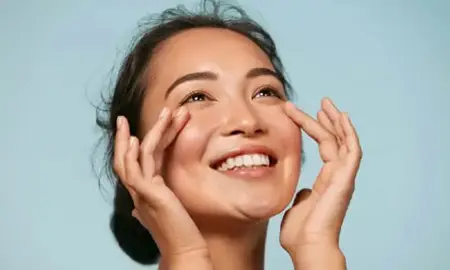 Woman tightening her face skin