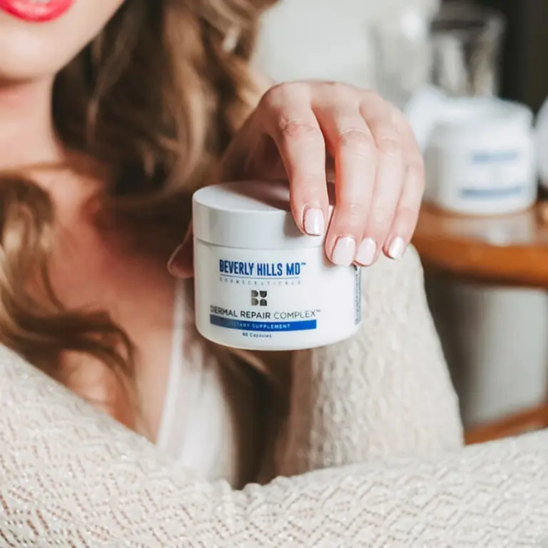 Woman caring Dermal Repair Complex